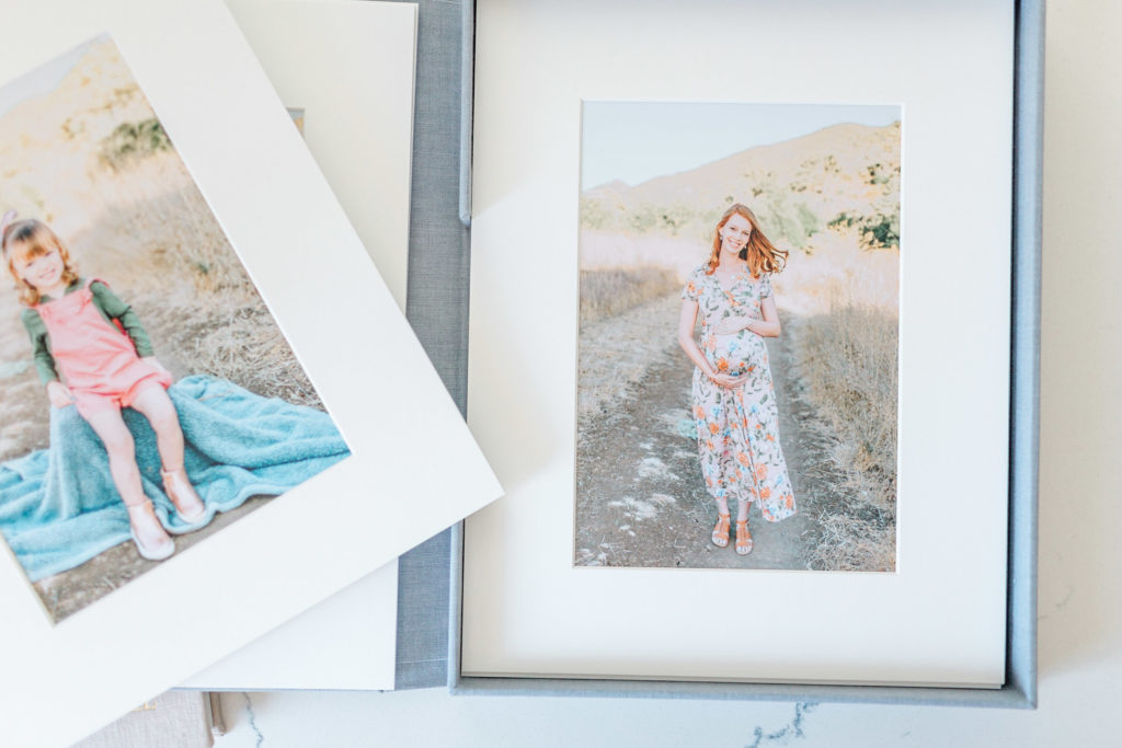photo of matted-photos with blue linen keepsake box